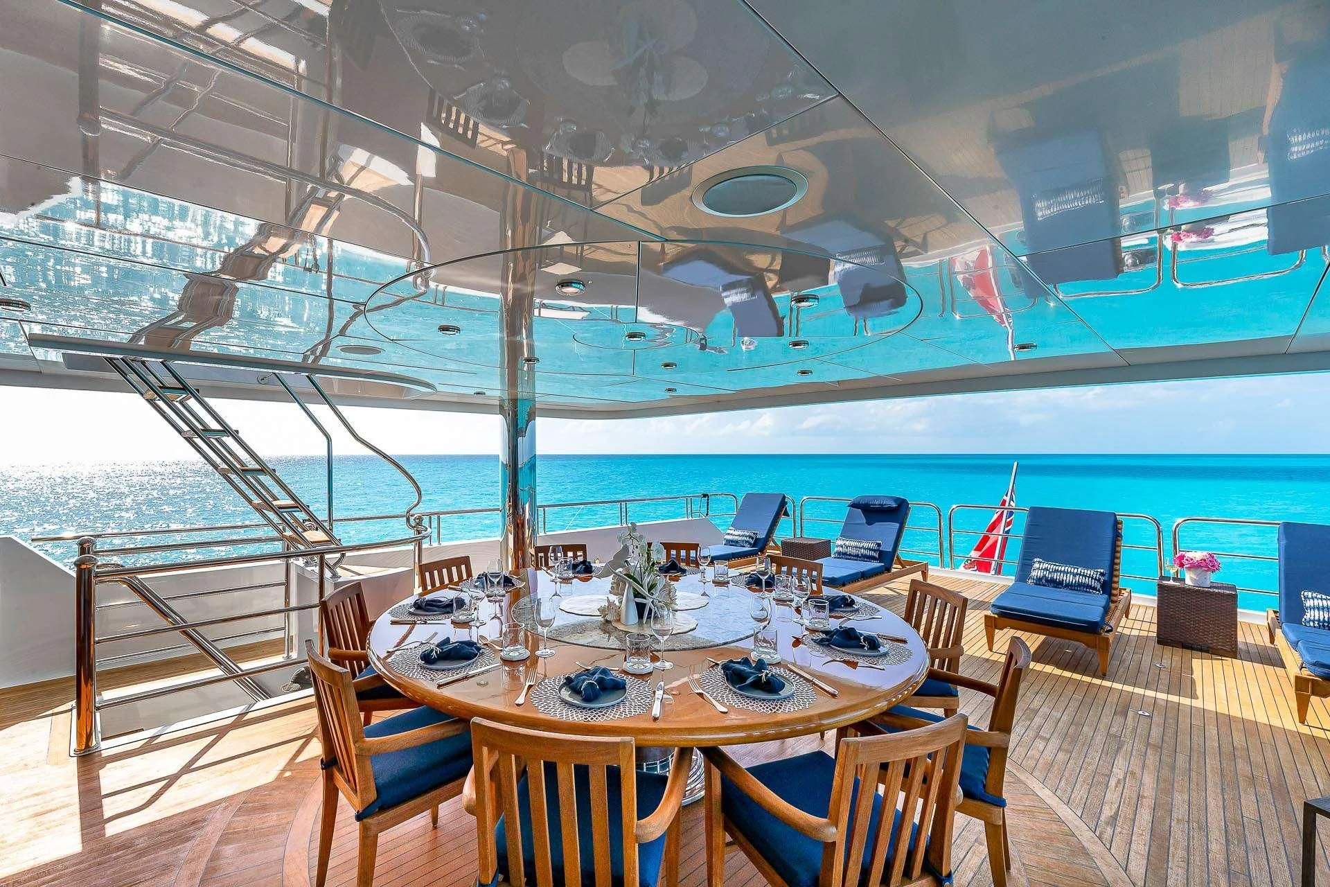 a room with a table and chairs aboard AMORE Yacht for Charter