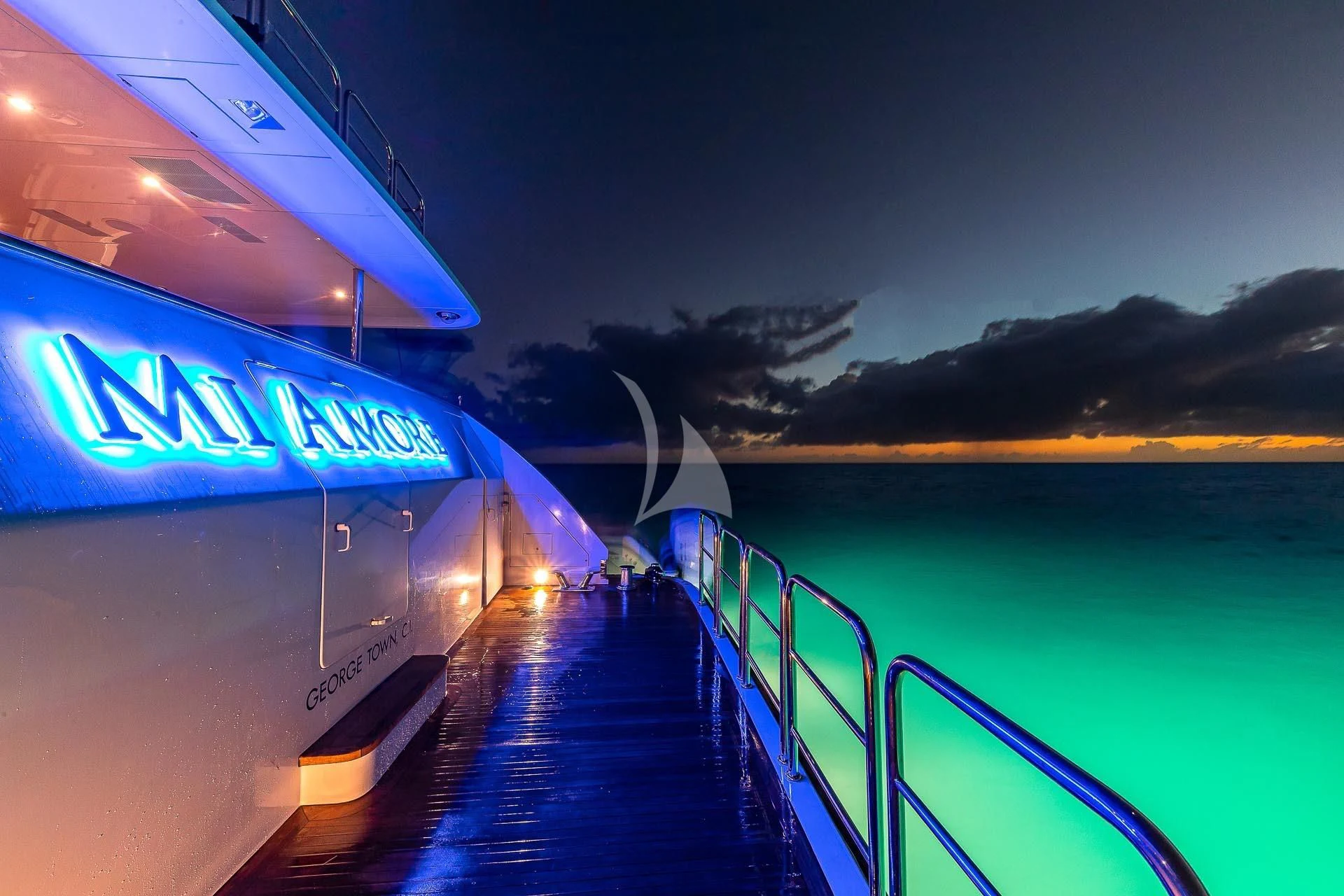 a train on a bridge aboard AMORE Yacht for Charter