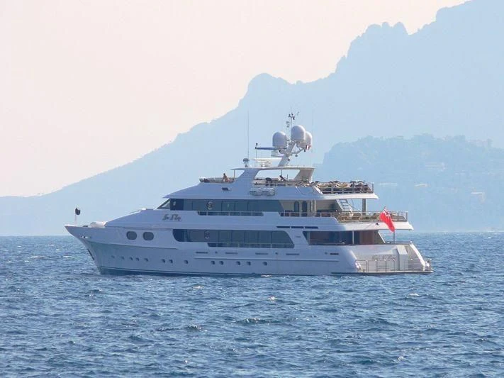 a large white boat in the water aboard AMORE Yacht for Charter