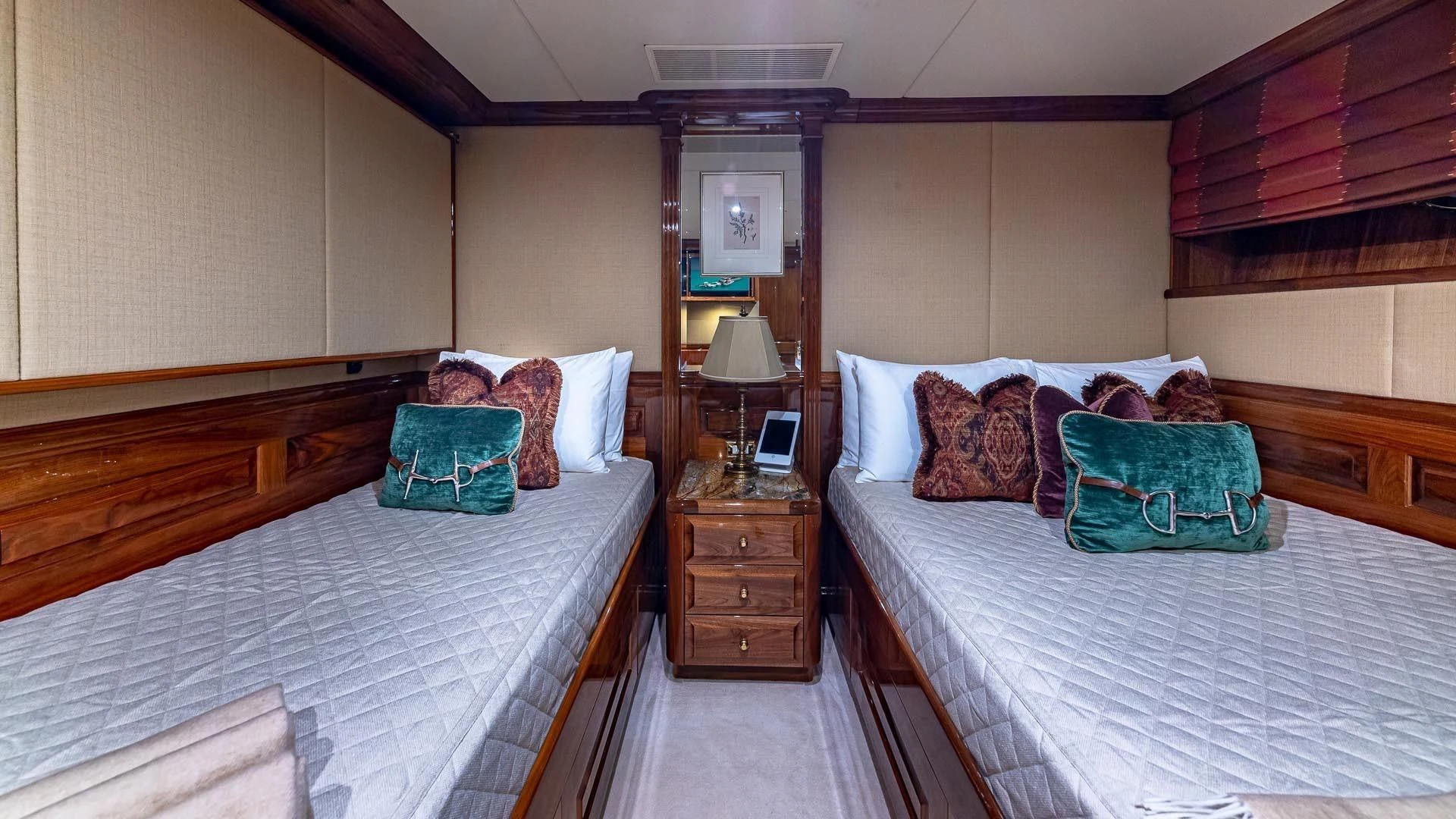 a bedroom with two beds aboard AMORE Yacht for Charter