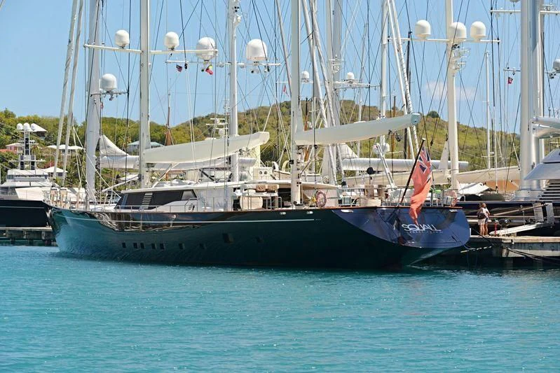 a boat docked at a pier aboard SQUALL Yacht for Sale