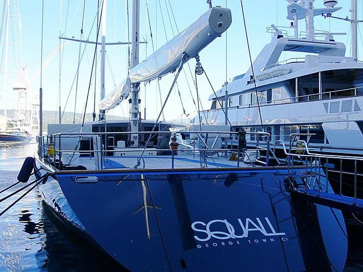 a boat docked at a pier aboard SQUALL Yacht for Sale