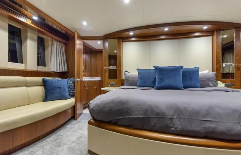 a bed in a room aboard CALYPSO Yacht for Sale