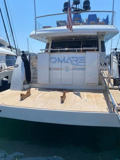 a boat with a person standing on the deck aboard D MARE Yacht for Sale