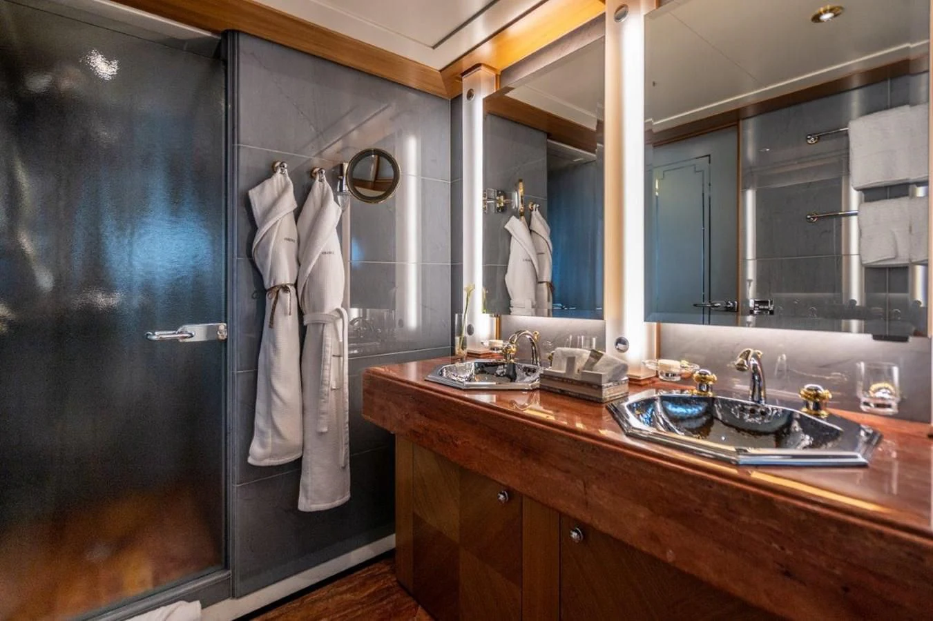 a bathroom with a sink and a mirror aboard VIBRANCE Yacht for Sale