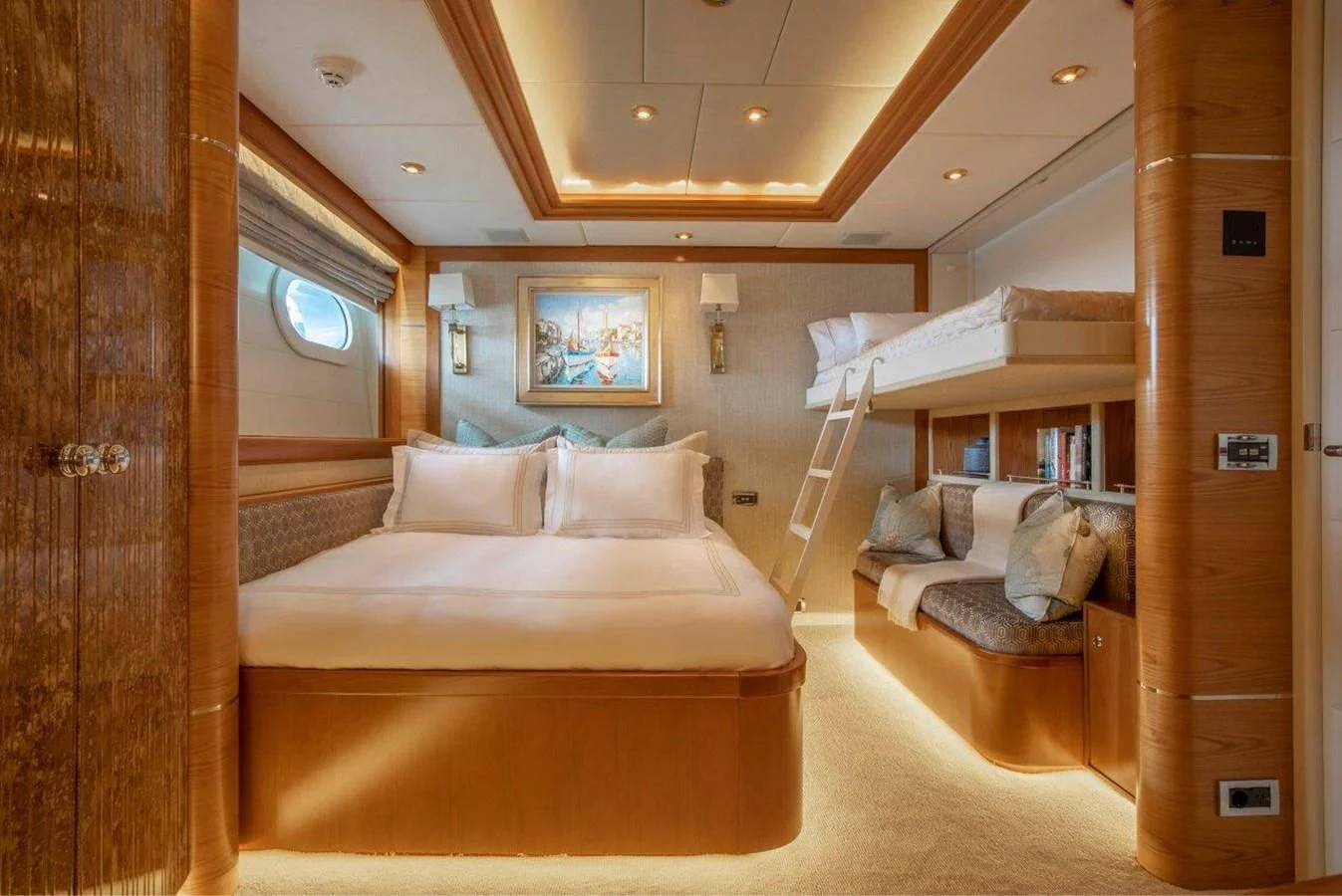 a room with a bed and a ladder aboard VIBRANCE Yacht for Sale