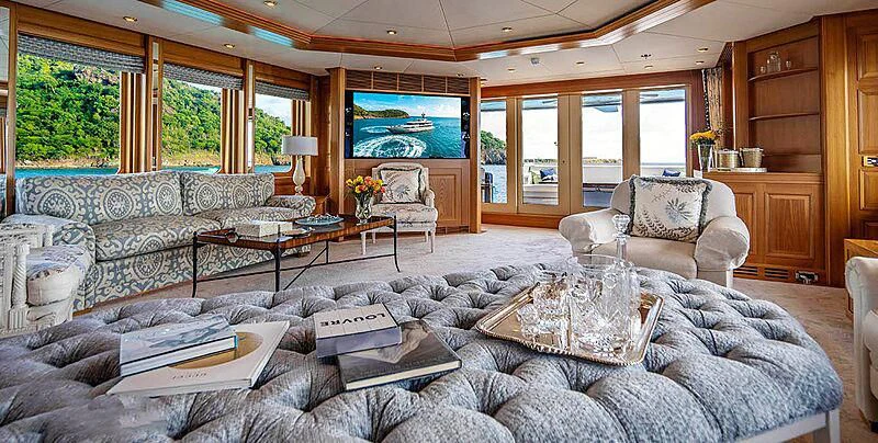 a living room with a large window aboard VIBRANCE Yacht for Sale