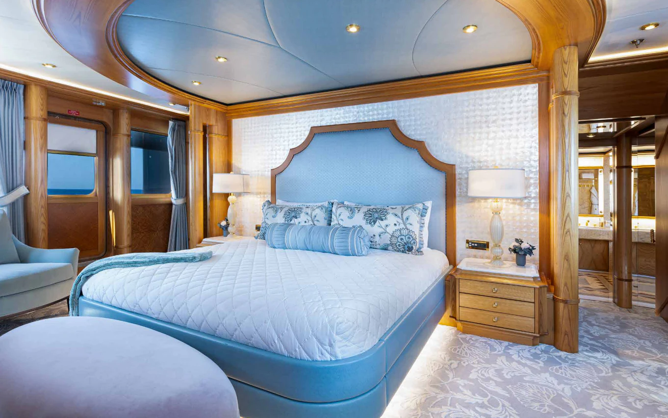 a bed in a room aboard VIBRANCE Yacht for Sale