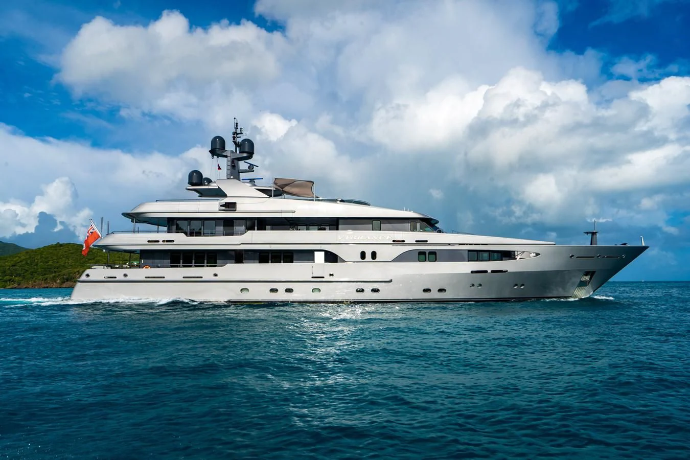 a large white ship in the water aboard VIBRANCE Yacht for Sale