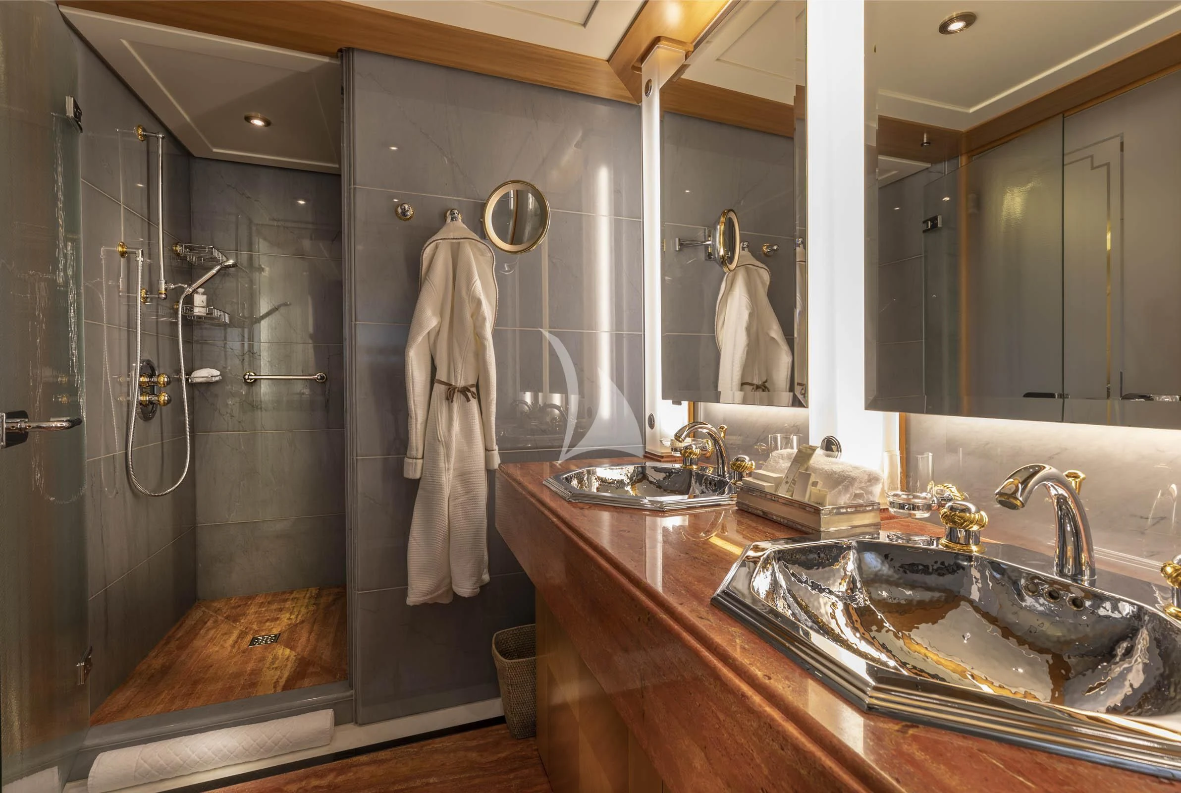 a bathroom with a large mirror aboard VIBRANCE Yacht for Sale