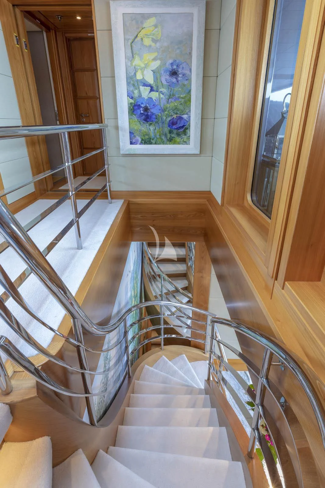 a staircase with a railing aboard VIBRANCE Yacht for Sale