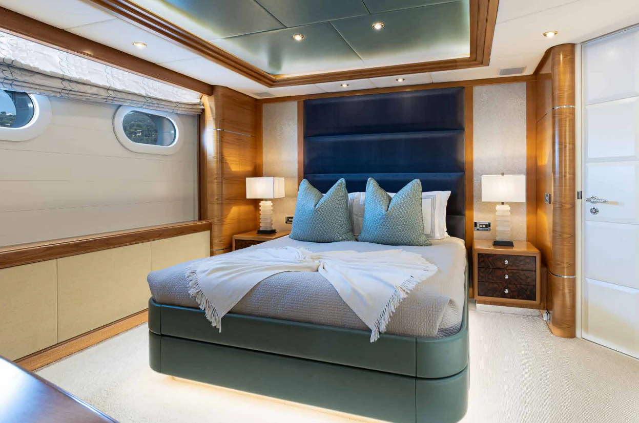 a bed in a room aboard VIBRANCE Yacht for Sale