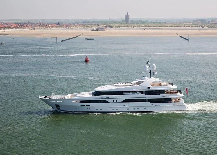 a white yacht in the water aboard VIBRANCE Yacht for Sale