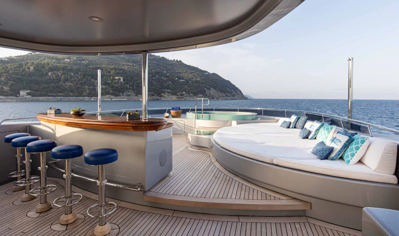 a large white bed on a boat aboard VIBRANCE Yacht for Sale