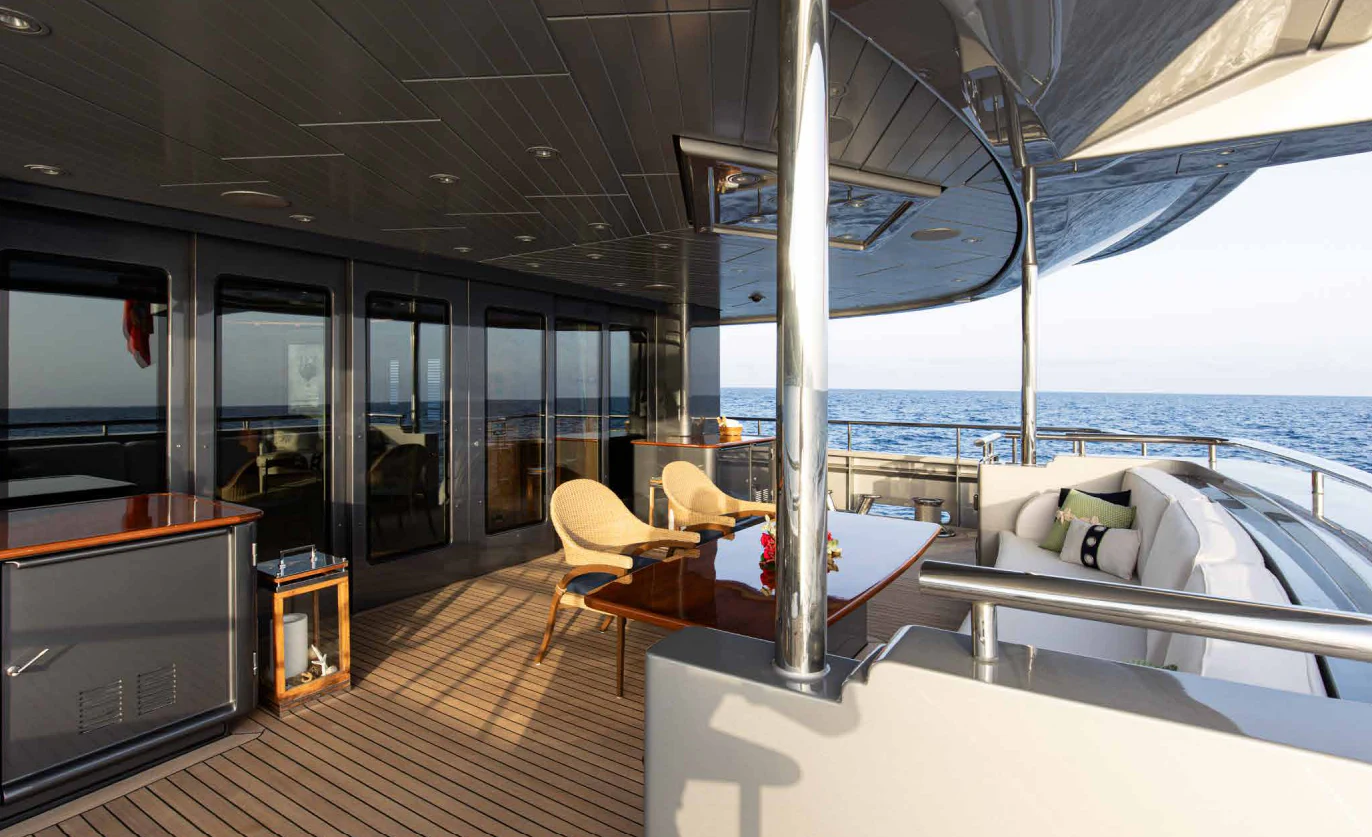 a room with a table and chairs aboard VIBRANCE Yacht for Sale