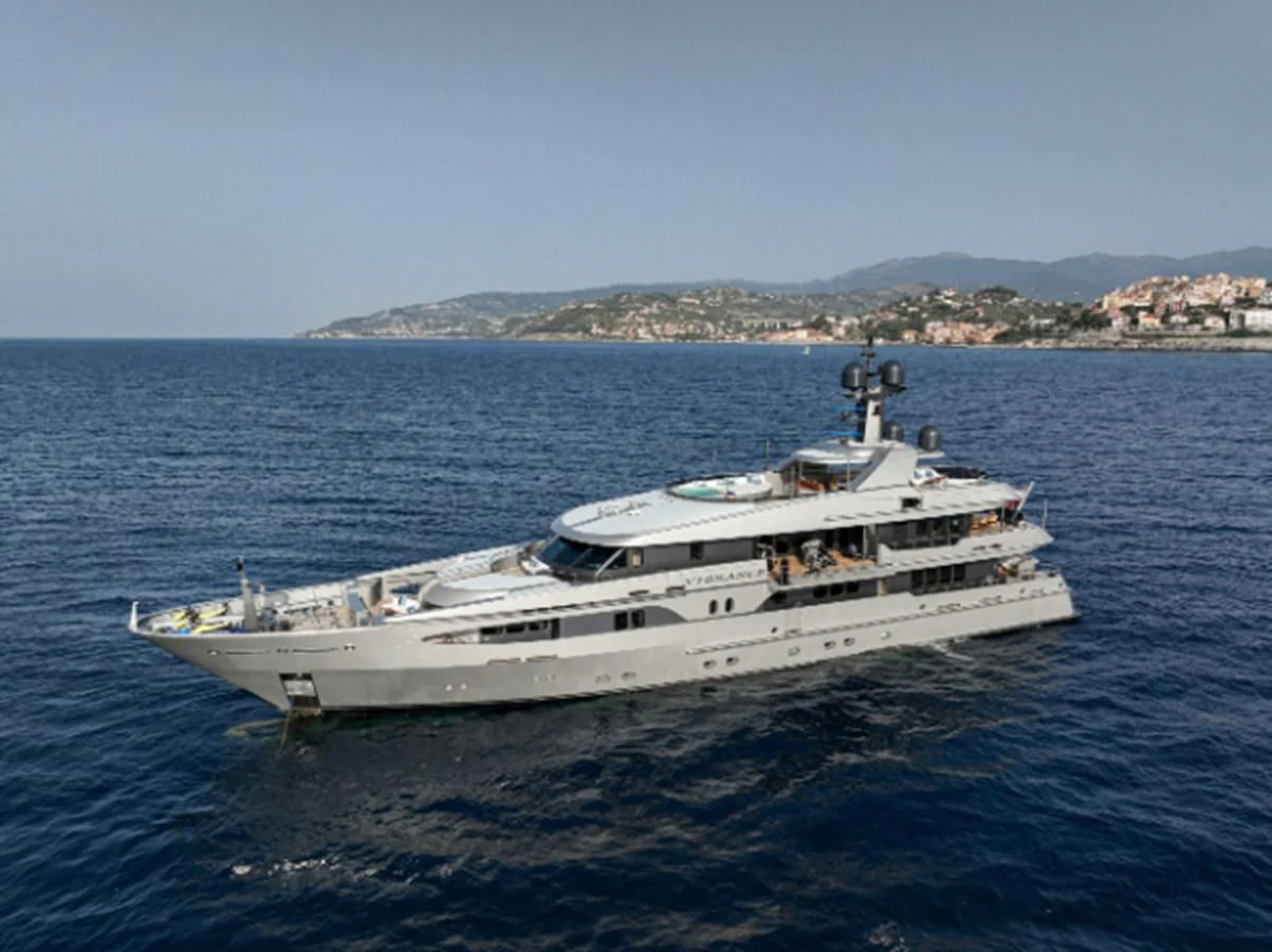 a white boat in the water aboard VIBRANCE Yacht for Sale
