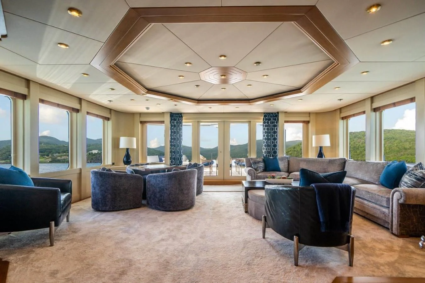 a large living room with a large open floor plan aboard VIBRANCE Yacht for Sale