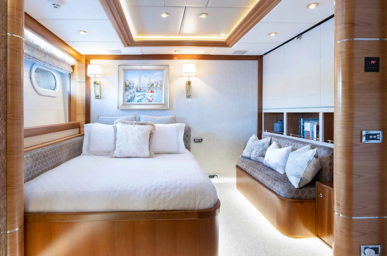 a room with two beds aboard VIBRANCE Yacht for Sale