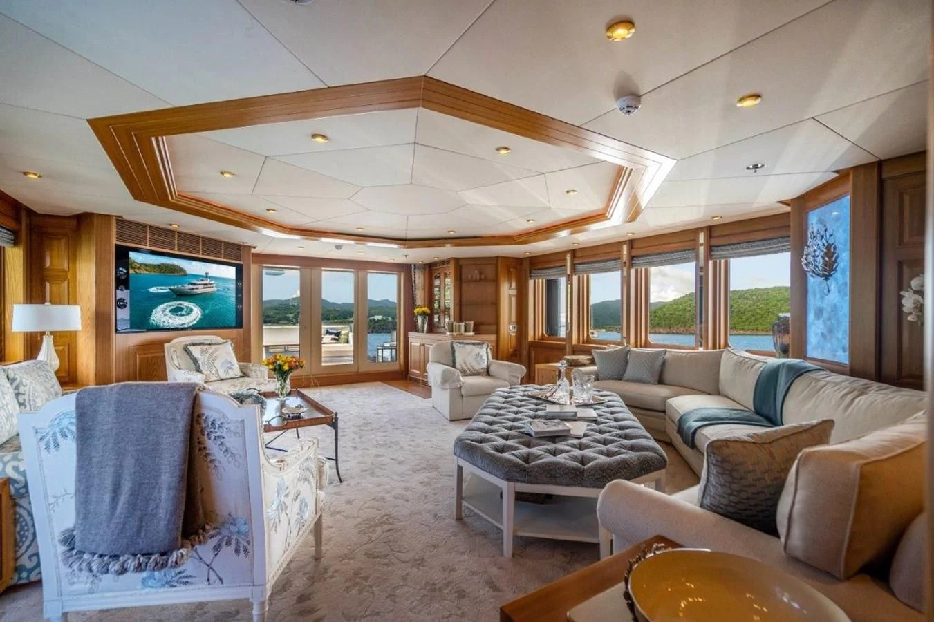 a living room with a large open ceiling aboard VIBRANCE Yacht for Sale