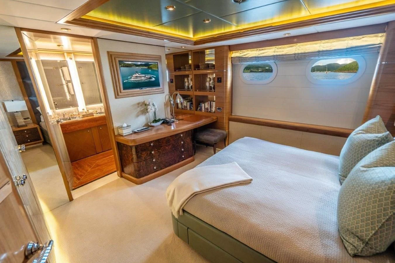 a room with a couch and a table aboard VIBRANCE Yacht for Sale