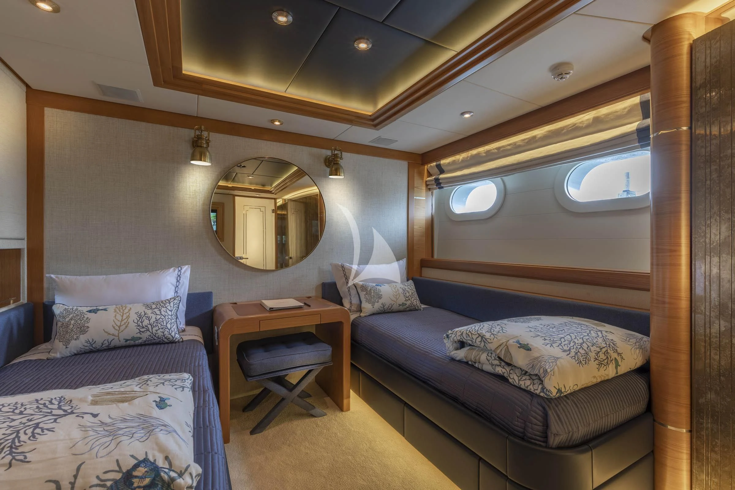 a room with two beds aboard VIBRANCE Yacht for Sale