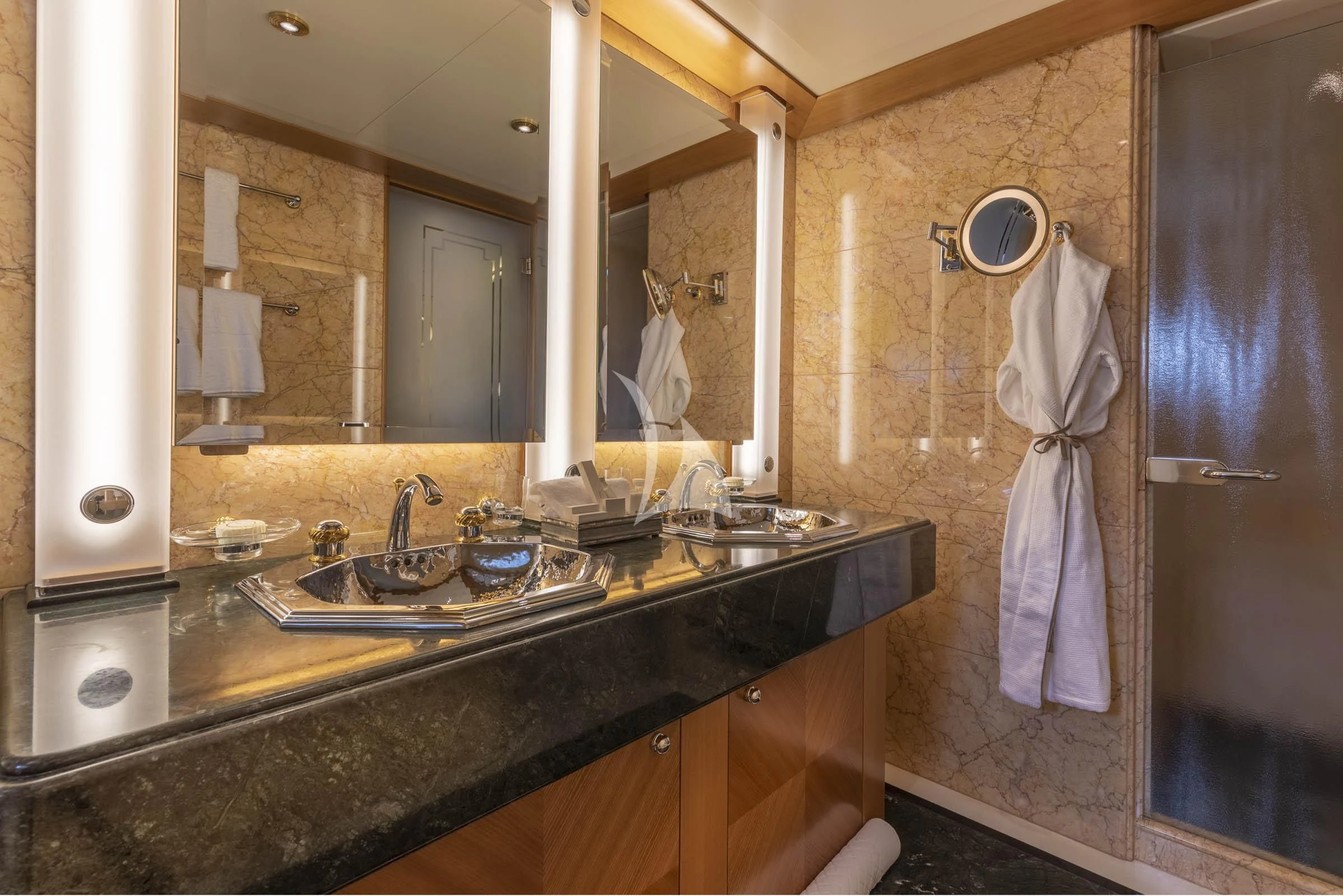 a bathroom with a large mirror aboard VIBRANCE Yacht for Sale