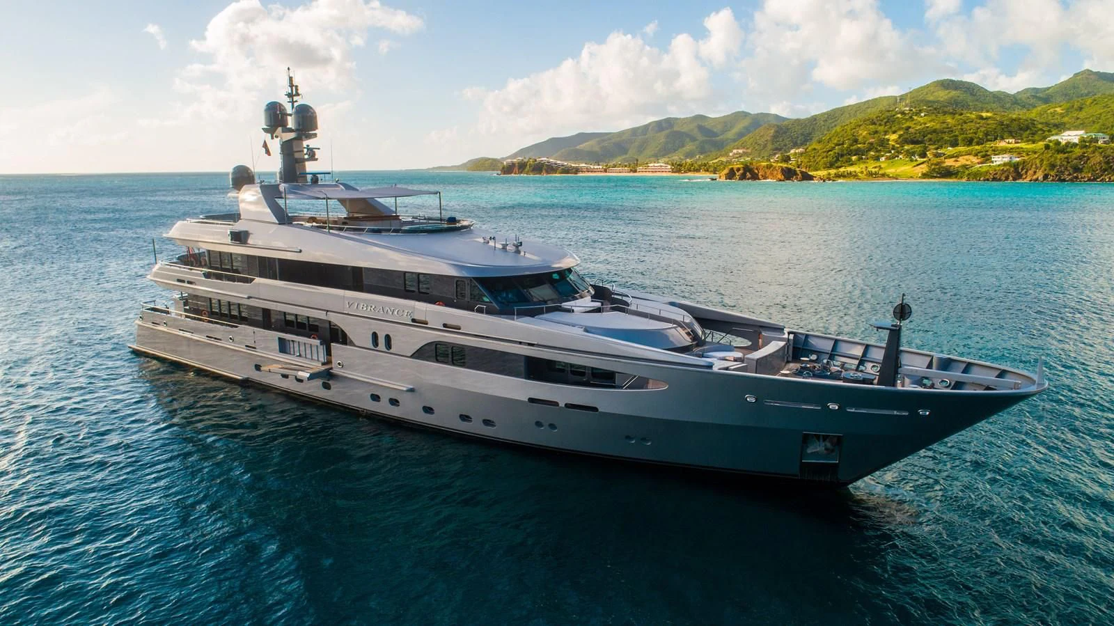 a large ship in the water aboard VIBRANCE Yacht for Sale