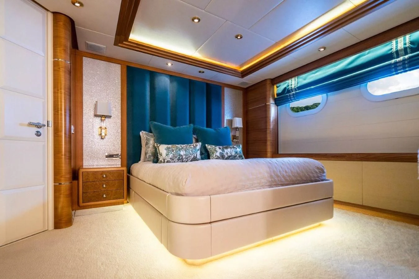 a bedroom with a bed aboard VIBRANCE Yacht for Sale