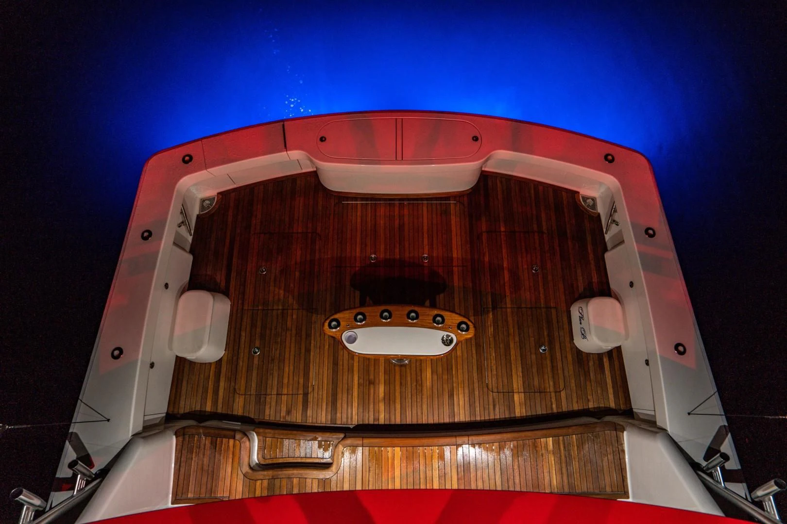a close-up of a white and red electric guitar aboard PLAN B Yacht for Sale