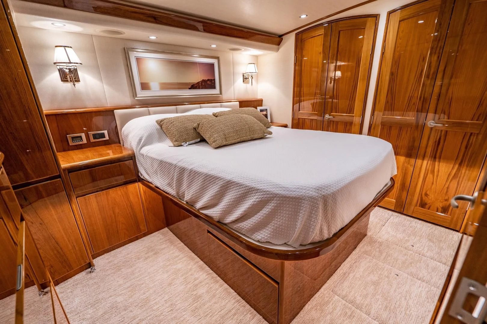 a bed in a room aboard PLAN B Yacht for Sale