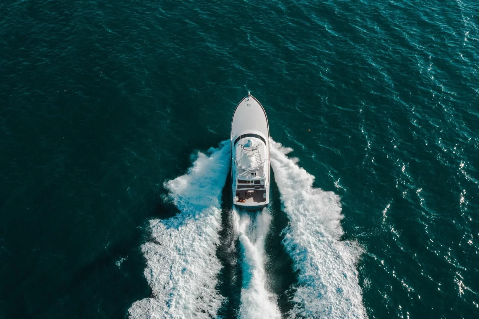 a boat in the water aboard PLAN B Yacht for Sale