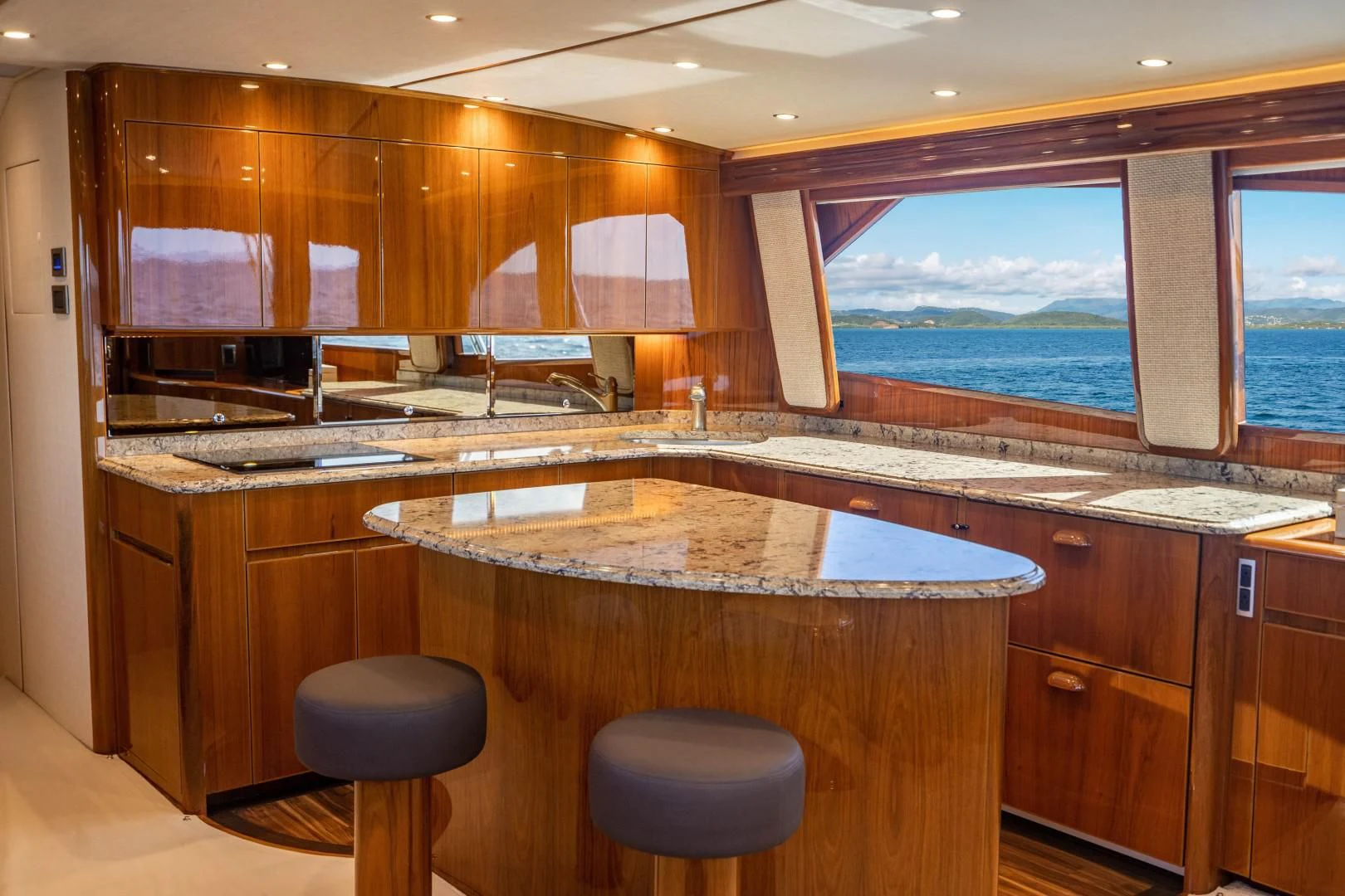 a kitchen with a large window aboard PLAN B Yacht for Sale
