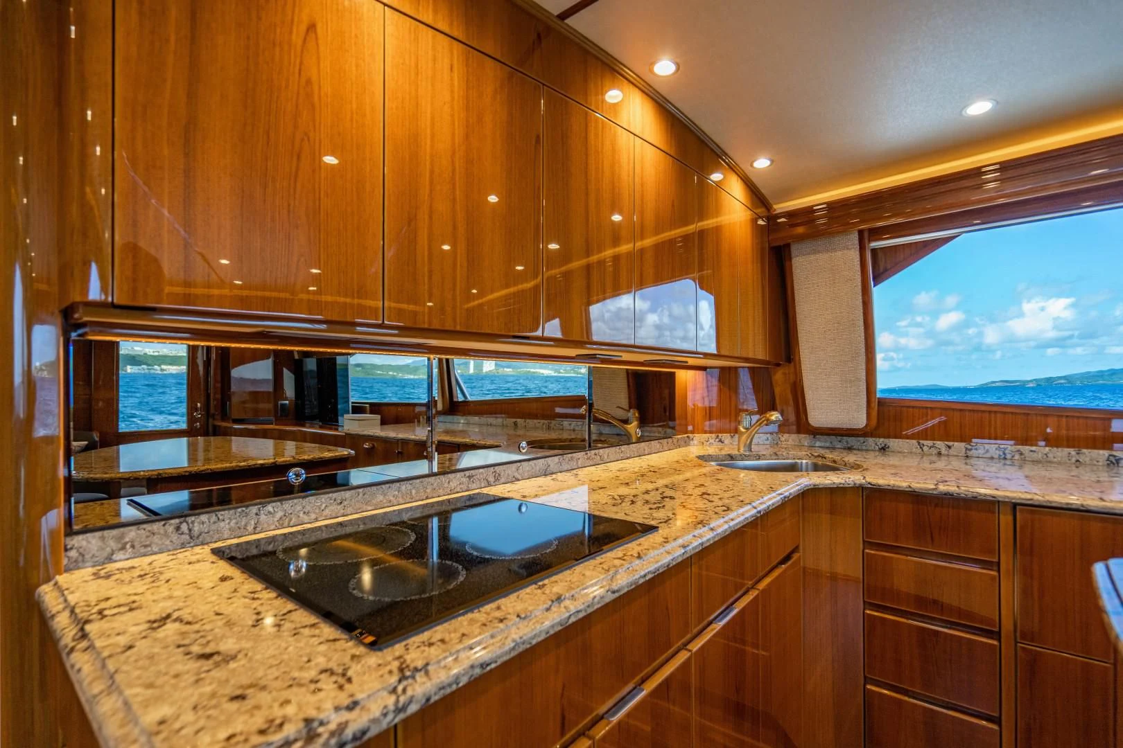 a kitchen with a large countertop aboard PLAN B Yacht for Sale