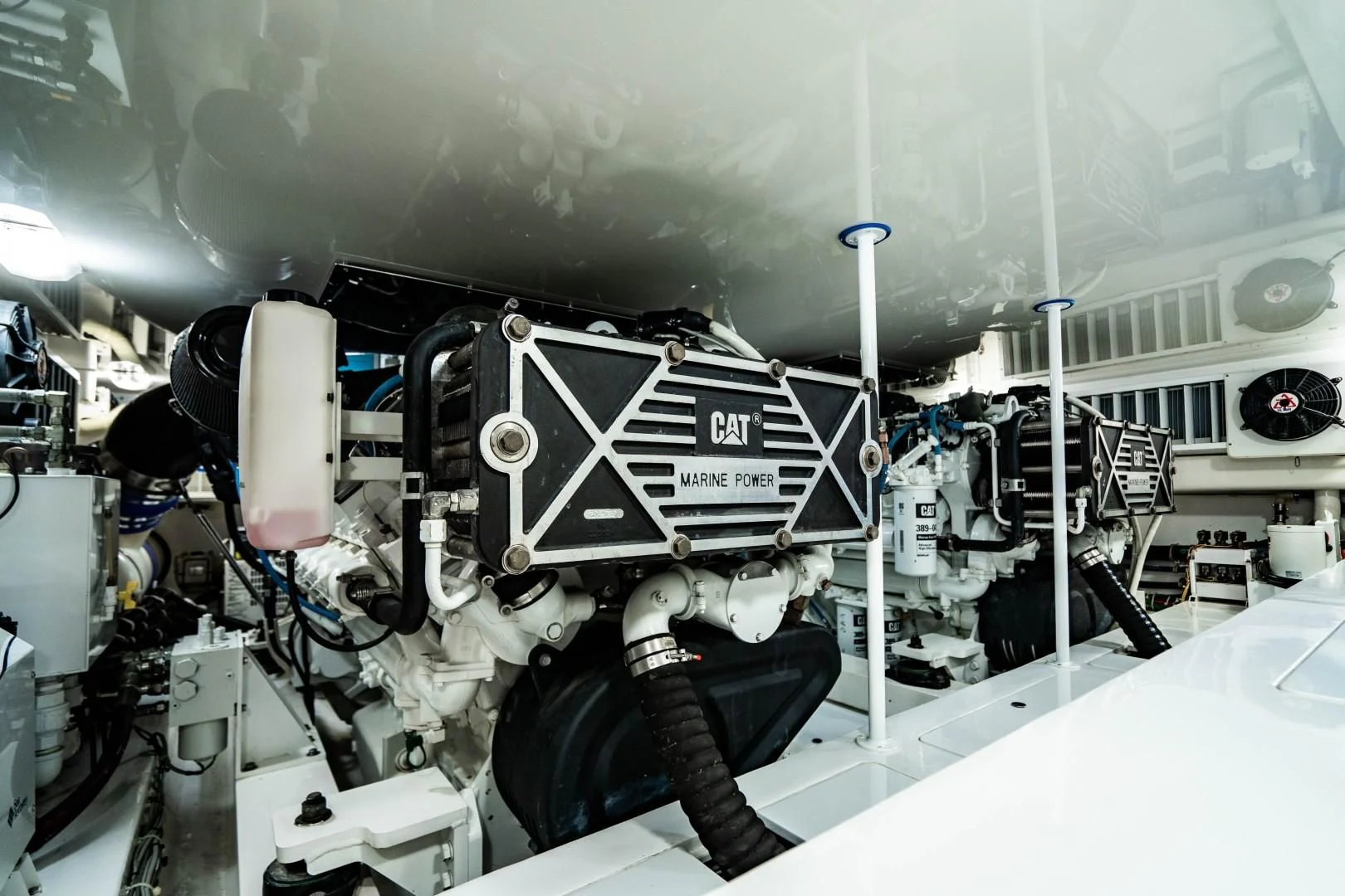 a machine with a large metal cylinder aboard PLAN B Yacht for Sale