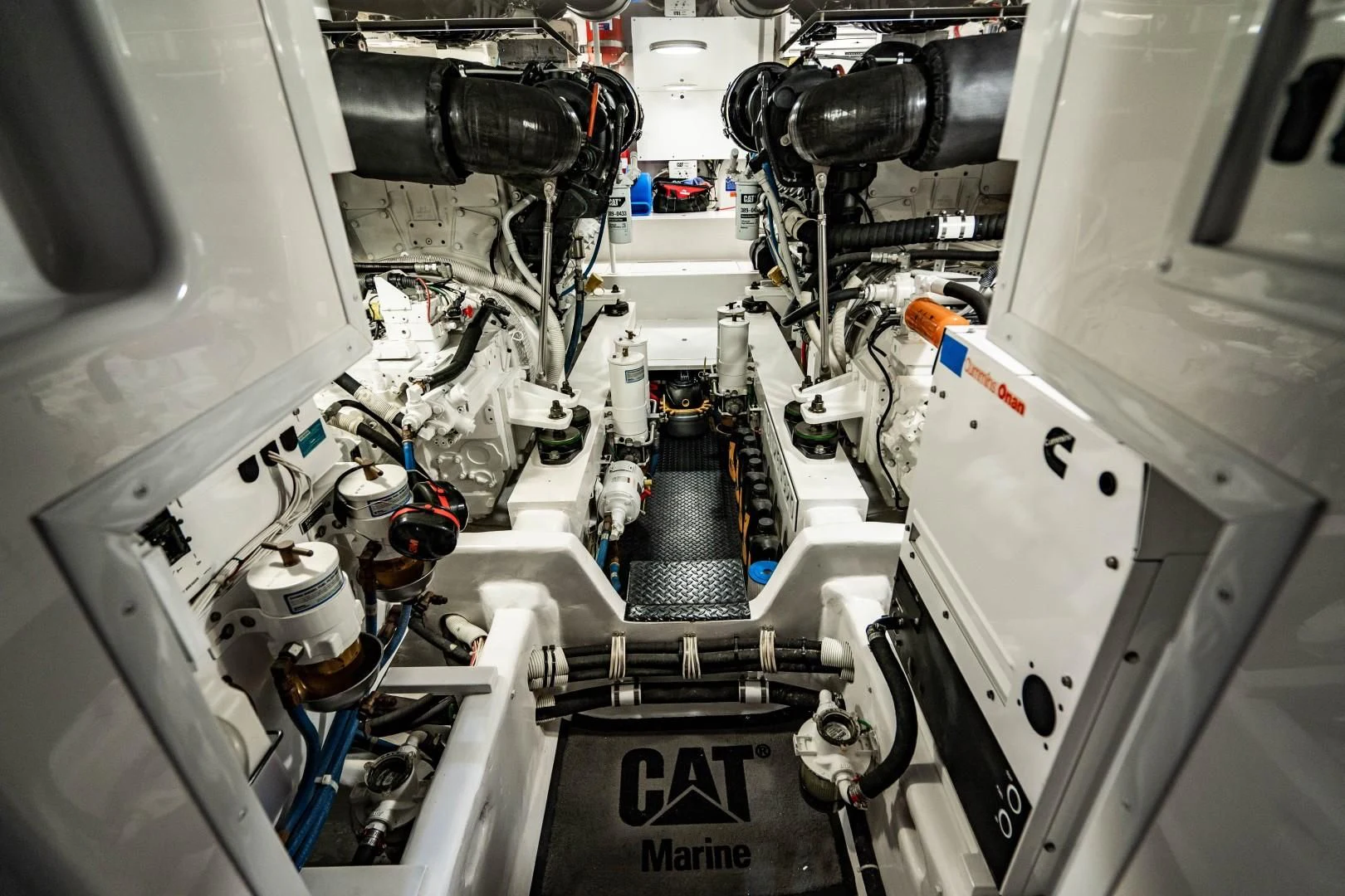 a close-up of a car engine aboard PLAN B Yacht for Sale