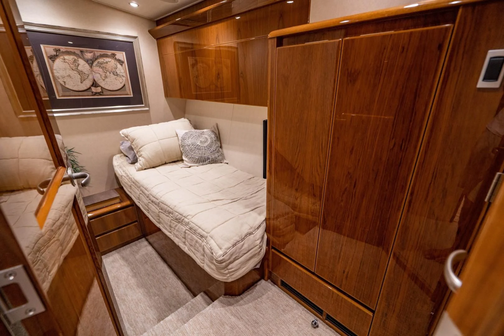 a bed in a room aboard PLAN B Yacht for Sale