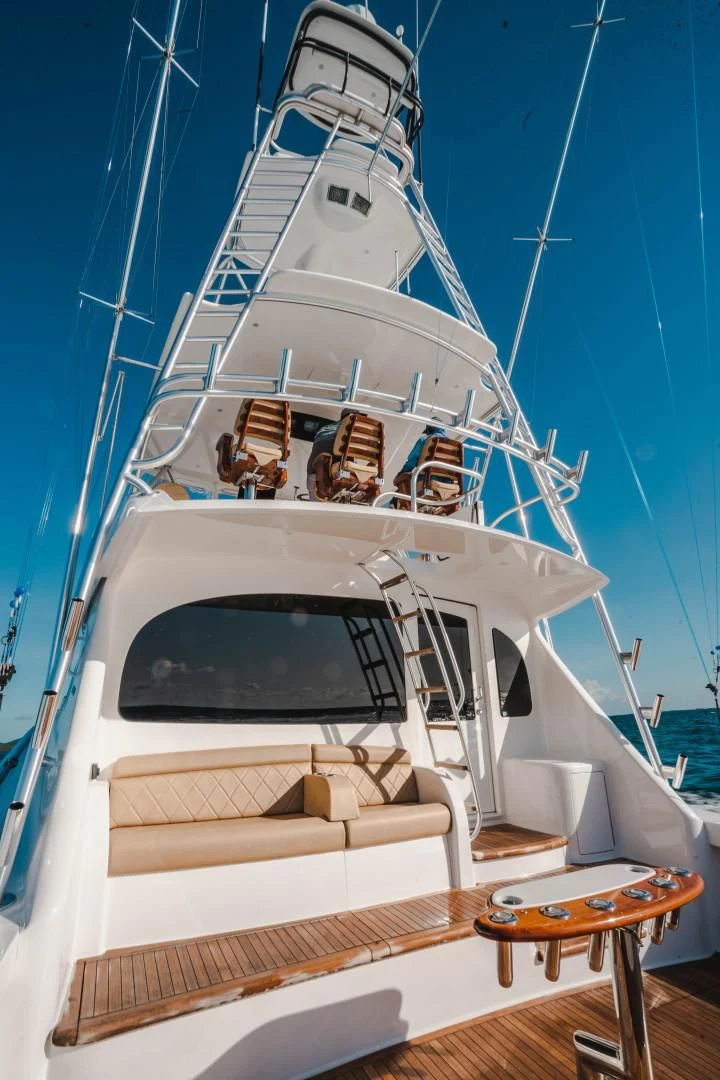 a white boat with a white interior aboard PLAN B Yacht for Sale