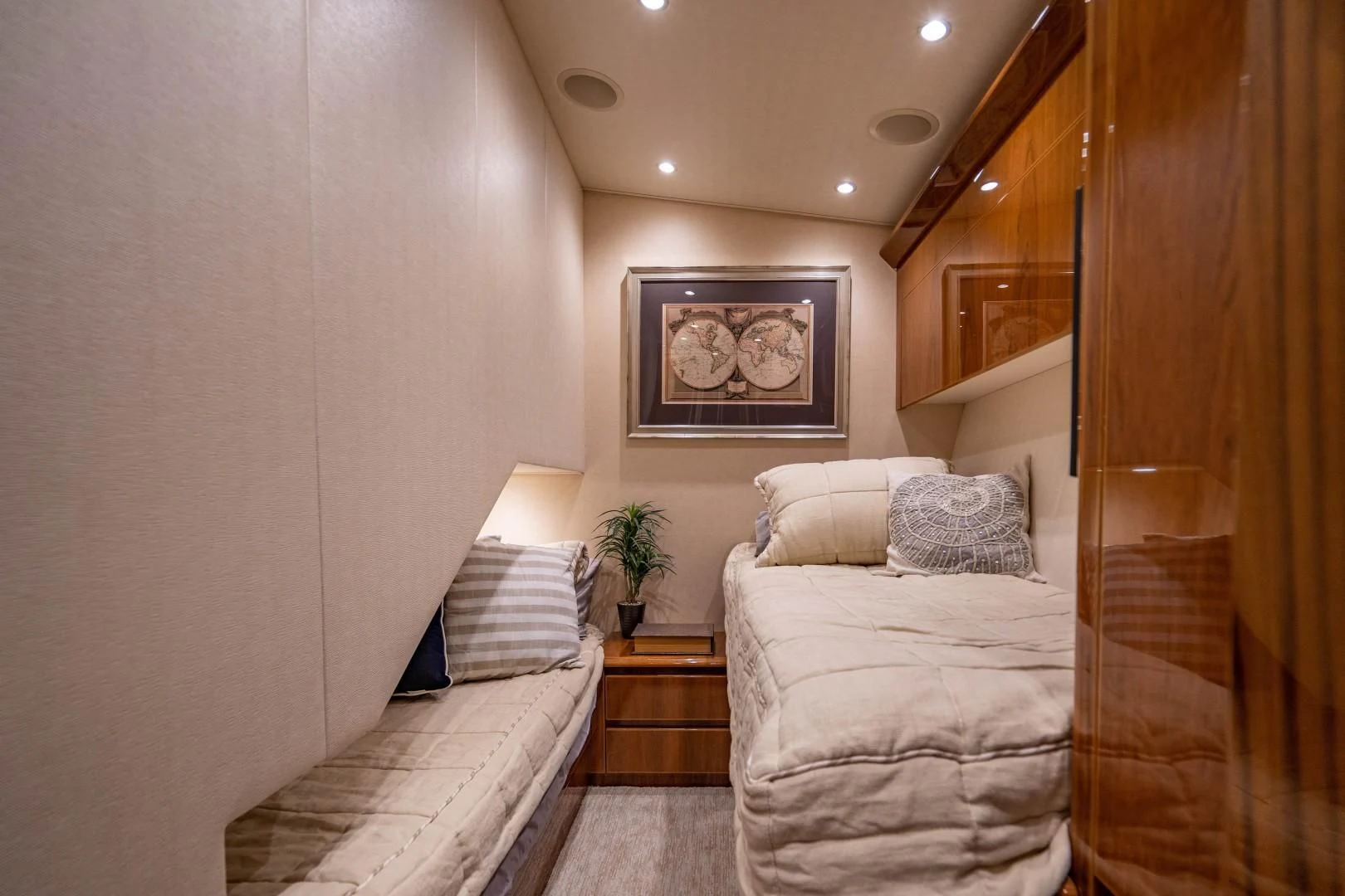a room with two beds aboard PLAN B Yacht for Sale
