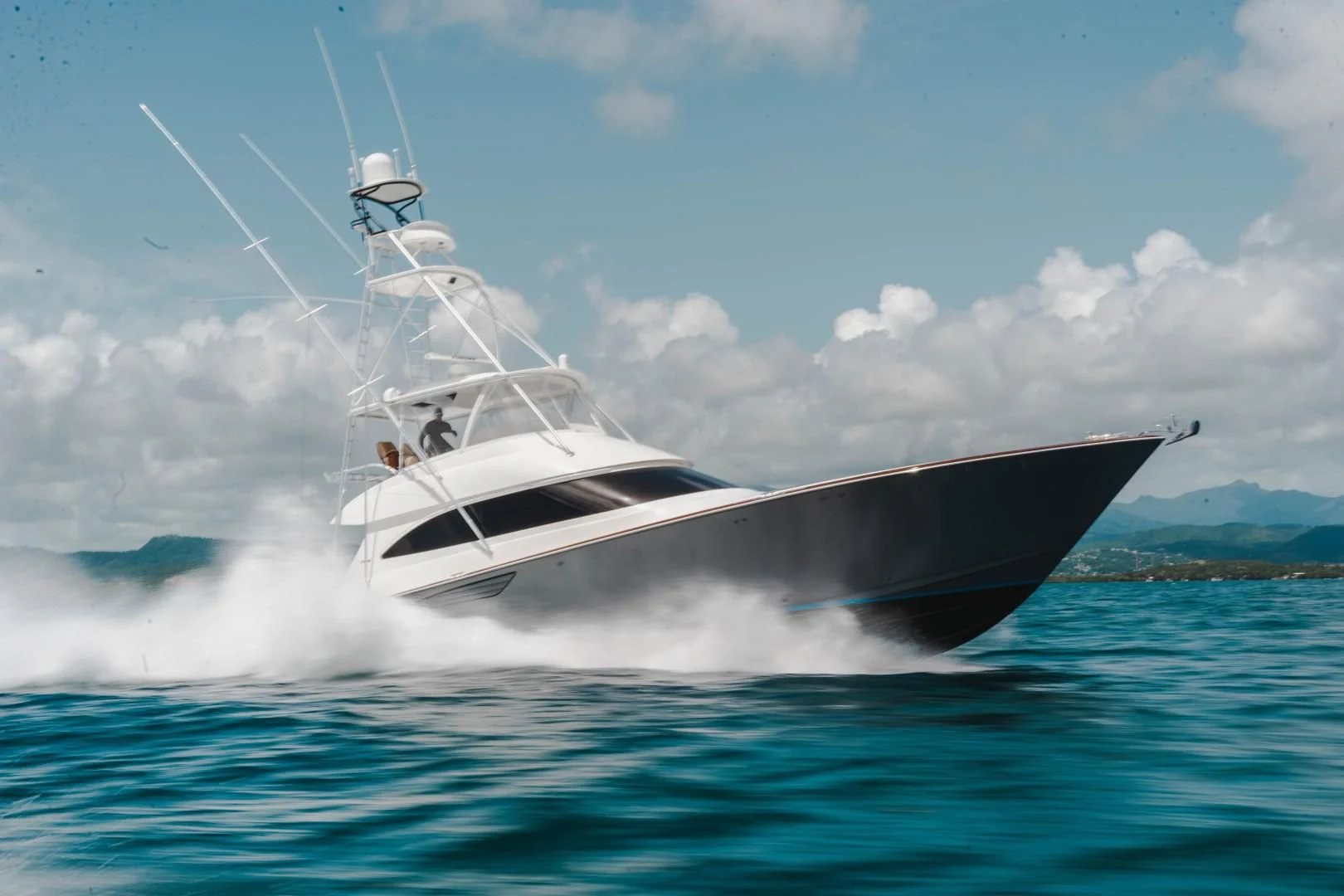 a boat on the water aboard PLAN B Yacht for Sale