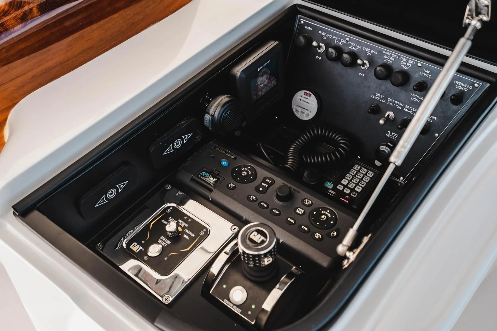 a close-up of a car stereo aboard PLAN B Yacht for Sale
