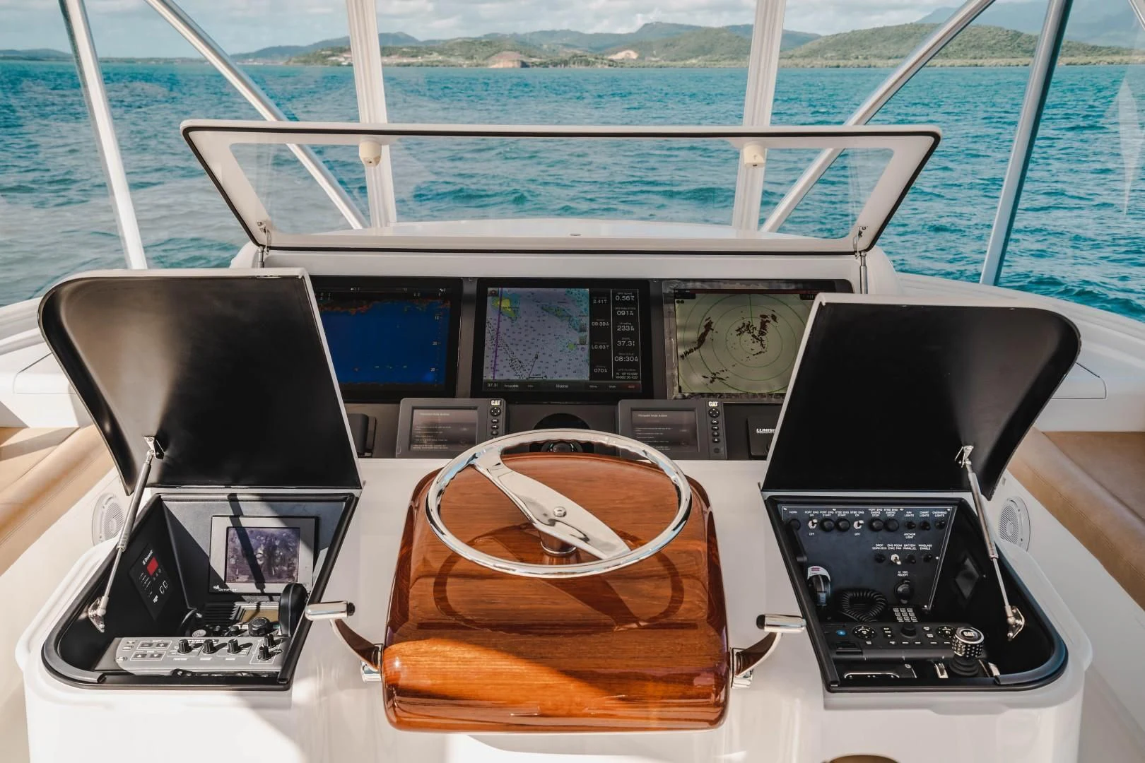 a boat with a couple of laptops on it aboard PLAN B Yacht for Sale