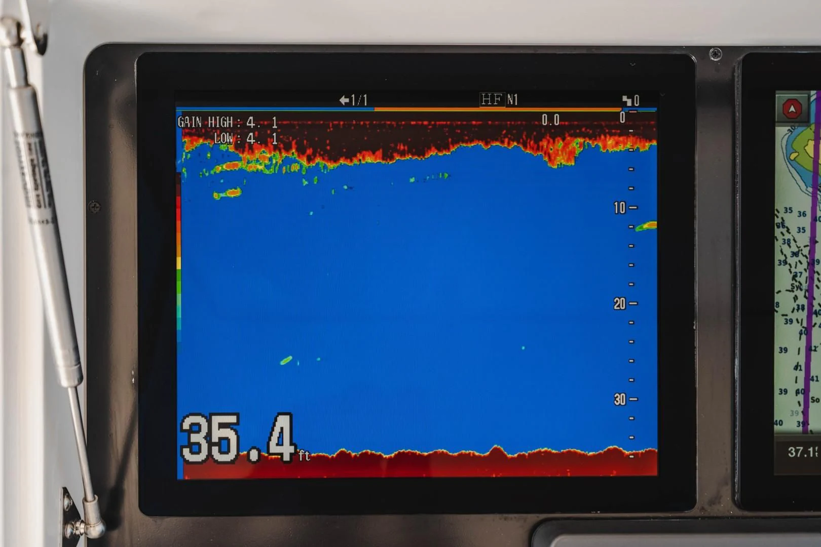 a computer screen with a red and blue screen aboard PLAN B Yacht for Sale