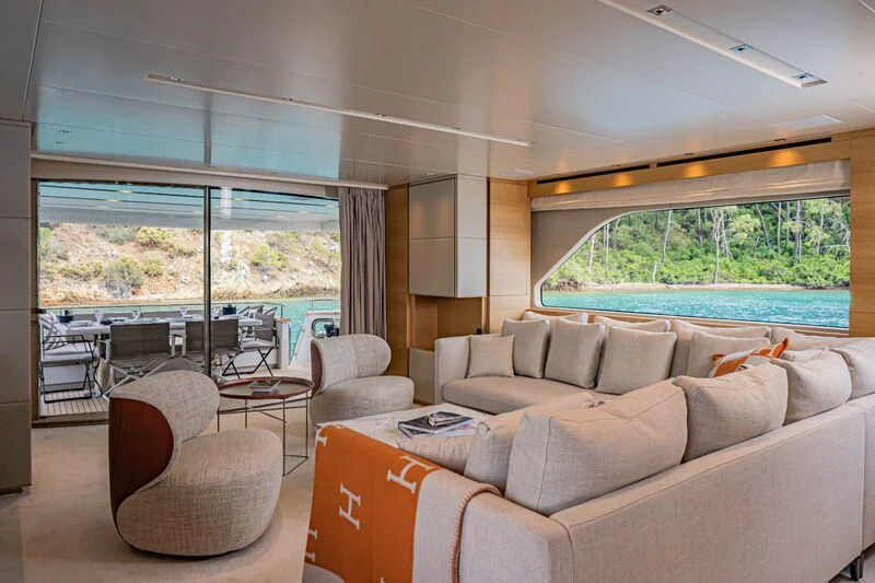 a living room with a couch and a table aboard SOUTH SEA Yacht for Sale