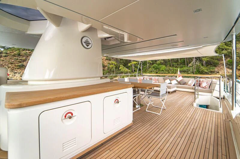 a large white machine on a wooden surface aboard SOUTH SEA Yacht for Sale