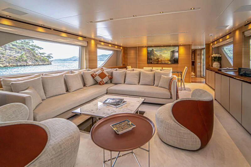 a living room with a couch and a table aboard SOUTH SEA Yacht for Sale