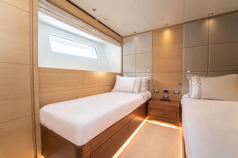 a room with a bed and a window aboard SOUTH SEA Yacht for Sale