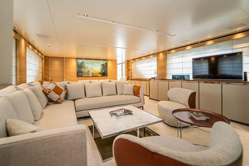 a living room with a couch and a table aboard SOUTH SEA Yacht for Sale