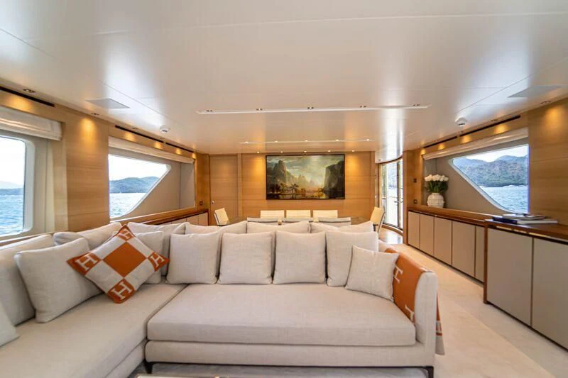 a large white couch in a room aboard SOUTH SEA Yacht for Sale