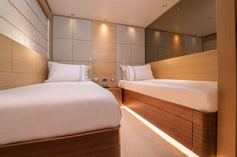 a room with two beds aboard SOUTH SEA Yacht for Sale