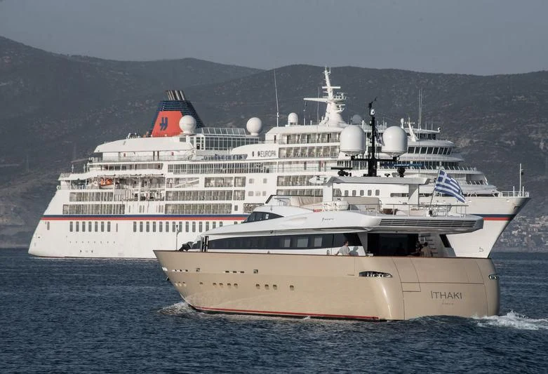a large white ship in the water aboard LOANA Yacht for Sale